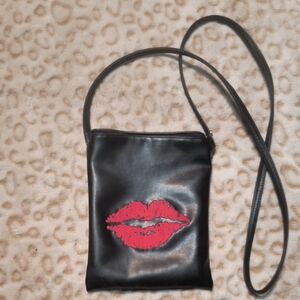 Demonia Black Crossbody Bag with Red Lip Accent